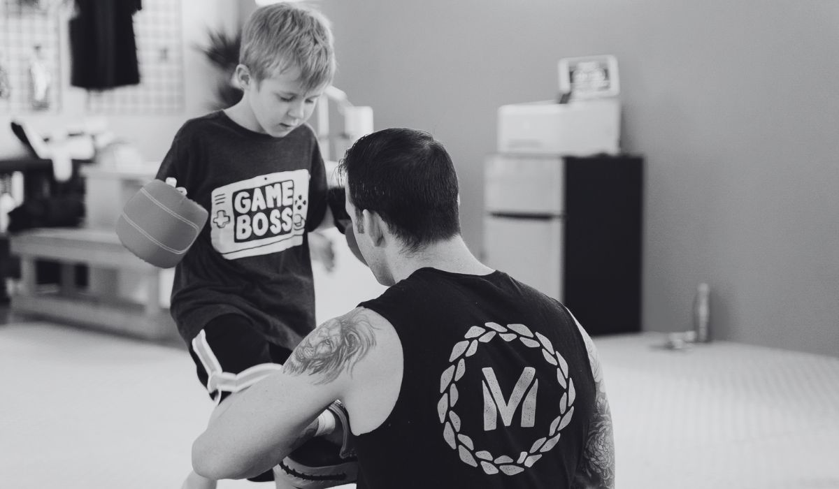 Muay Thai kids class downtown toronto at montrait Muay Thai hosted in a mma gym in little Portugal every Tuesday, Thursday, and saturday