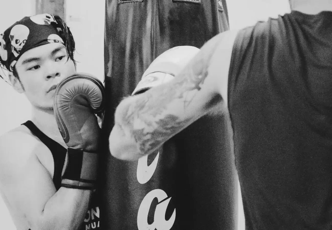 two people training martial arts in the gym